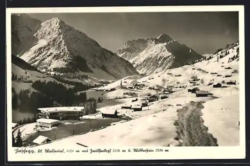 AK Hirschegg /Kl. Walsertal, Ortspartie mit Zwölferkopf und Widderstein im Schnee