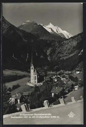 AK Heiligenblut, Ortsansicht von der Grossglockner-Hochalpenstrasse gegen den Grossglockner