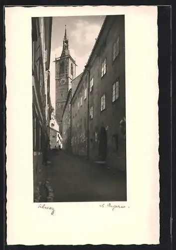 AK Schwaz, Strassenpartie mit Blick zur Kirche