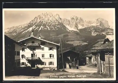 AK Ellmau, Ortspartie mit Gasthaus Lobewein gegen Kaisergebirge