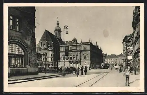 AK Troppau, Strasse Oberring mit Theater, Pfarrkirche und Strassenbahn