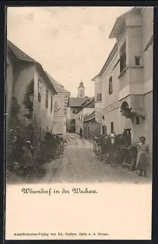 AK Wösendorf in der Wachau, Strassenpartie mit Gasthof und Kutsche