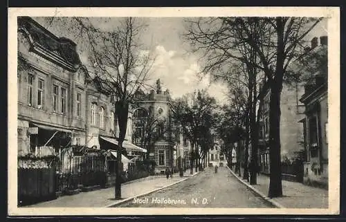 AK Hollabrunn /N. D., Strassenpartie mit einer Konditorei