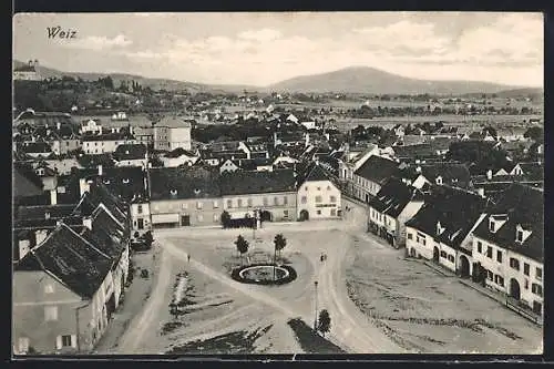 AK Weiz, Teilansicht und Strassenpartie mit Denkmal