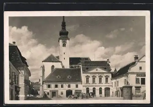 AK Pulkau /N.-Ö., Ortspartie mit Haus Eduard Müller und Kirche