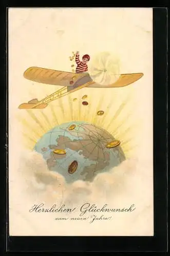 AK Knabe wirft Geld aus einem Flugzeug auf eine Weltkugel mit Goldverzierungen