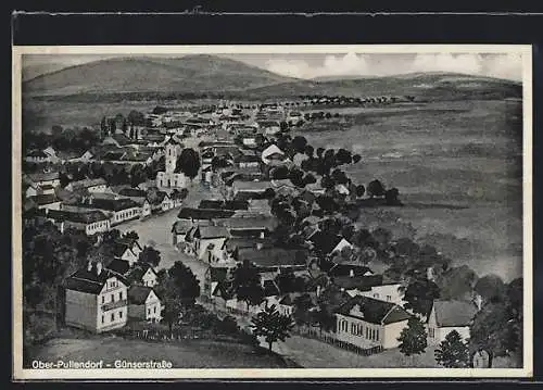 AK Oberpullendorf, Ortsansicht mit Günserstrasse und Bergpanorama aus der Vogelschau