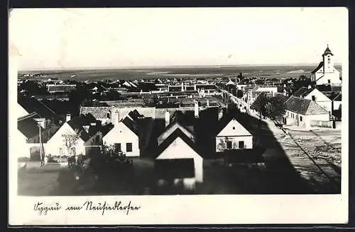 AK Oggau am Neusiedlersee, Ortsansicht mit der Kirche rechts