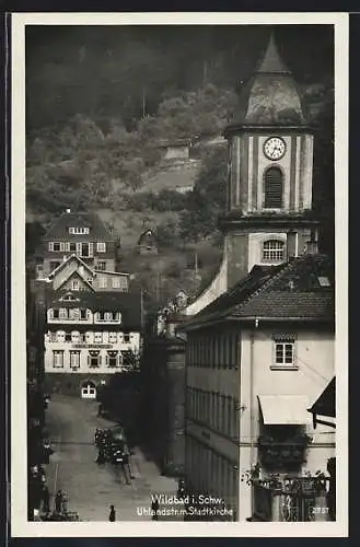 AK Wildbad / Schwarzwald, Uhlandstr. mit Stadtkirche