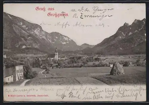 AK Grossgmain, Ortsansicht mit Kirche über Feld mit Gebirge