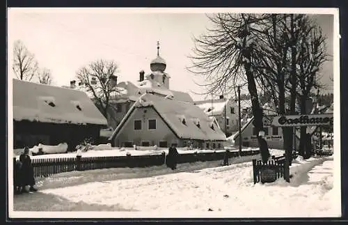 AK St. Aegyd a. N., Gasthaus zum Blumentritt am verschneiten Markt