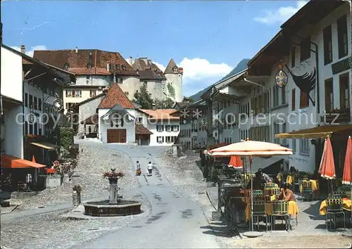 Gruyeres FR Dorfpartie mit Brunnen Kat. Gruyeres