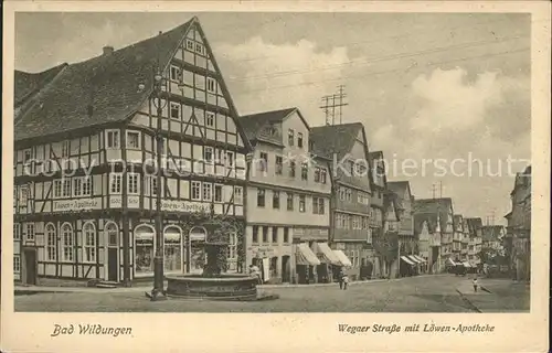 Bad Wildungen Wegaer Strasse mit Loewen Apotheke Fachwerkhaus Brunnen Kat. Bad Wildungen