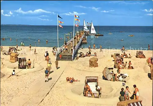 Scharbeutz Ostseebad Strand mit Seebruecke Kat. Scharbeutz