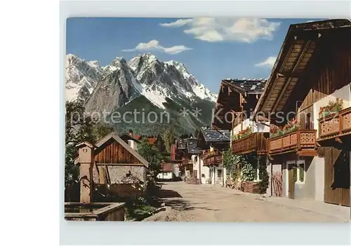 Garmisch Partenkirchen Fruehlingsstrasse mit Waxenstein und Zugspitze Kat. Garmisch Partenkirchen