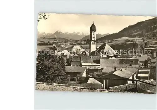 Nesselwang Ortsansicht mit Kirche Saeuling Zugspitze Alpenkette Kat. Nesselwang