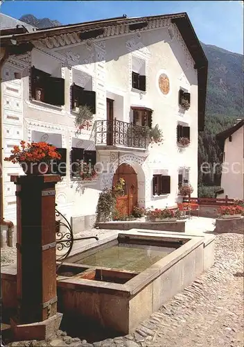 Bad Scuol Engadinerhaus mit Brunnen Kat. Scuol