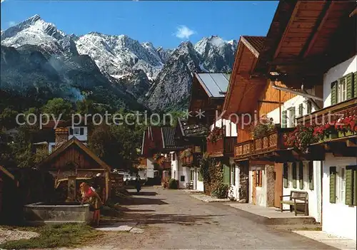 Garmisch Partenkirchen Fruehlingsstrasse mit Zugspitzgruppe Kat. Garmisch Partenkirchen