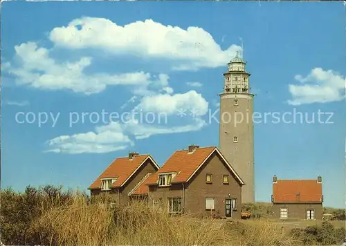 Texel Haeuser mit Leuchtturm Kat. Niederlande