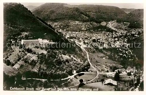 Urach Bad mit Haus auf der Alb Schwaebische Alb Fliegeraufnahme Kat. Bad Urach