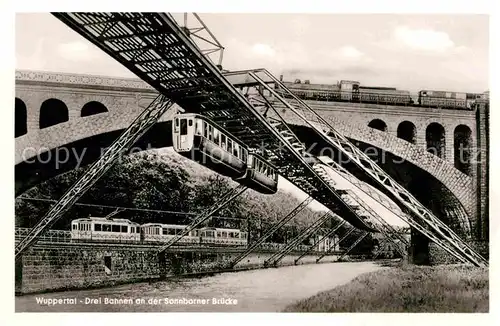 Wuppertal Schwebebahn Drei Bahnen an der Sonnborner Bruecke Kat. Wuppertal