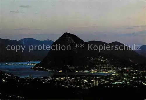 Lugano Lago di Lugano Panorama con Monte San Salvatore notturno Luganersee