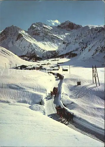 AK / Ansichtskarte Sertig Doerfli Pferdeschlittenfahrt mit Mittagshorn Plattenhorn und Hochducan / Sertigpass /Rg. Sertig Doerfli