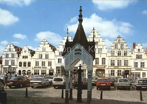 AK / Ansichtskarte Friedrichstadt Eider Marktbrunnen mit historischen Giebelhaeusern Kat. Friedrichstadt