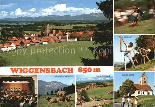 AK / Ansichtskarte Wiggensbach Gesamtansicht mit Alpenpanorama Grasski Vita Parcour Ermengerst Kirche Schwimmbad Alpvieh Heimatabend Kat. Wiggensbach