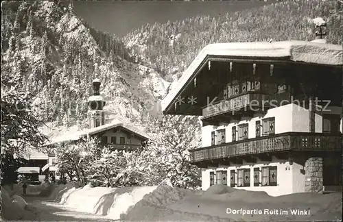 AK / Ansichtskarte Reit Winkl Dorfpartie Kirche Winterimpressionen Kat. Reit im Winkl