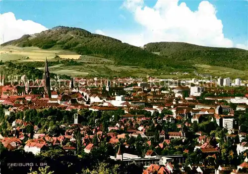 AK / Ansichtskarte Freiburg Breisgau Stadtbild mit Freiburger Muenster und Schoenberg Kat. Freiburg im Breisgau