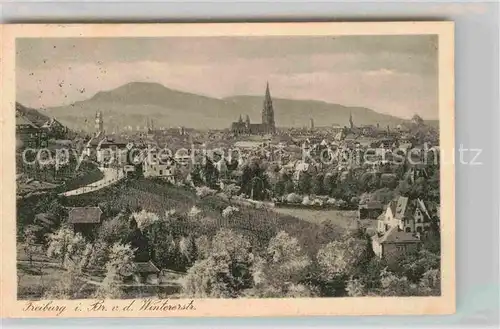 AK / Ansichtskarte Freiburg Breisgau Stadtbild mit Muenster Blick von der Wintererstrasse Kat. Freiburg im Breisgau