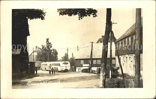 AK / Ansichtskarte Zinnwald Georgenfeld Ortsstrasse Bus Kat. Altenberg