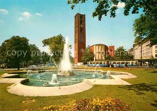 AK / Ansichtskarte Muenchen Matthaeuskirche am Sendlingertorplatz Fontaene Wasserspiele Kat. Muenchen