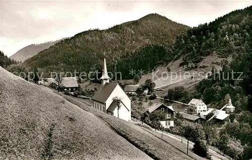 AK / Ansichtskarte Wildgutach Gasthaus Pension zum Loewen Kirche Kat. Simonswald