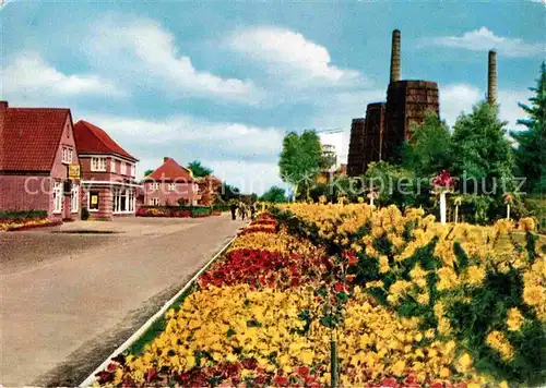 AK / Ansichtskarte Wiesmoor Blumenschmuck beim Torhaus Kat. Wiesmoor