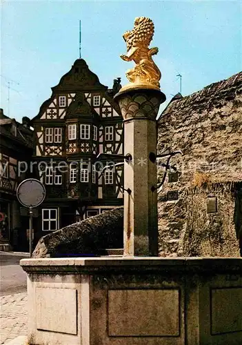 AK / Ansichtskarte Idstein Loewenbrunnen Killingerhaus Kat. Idstein