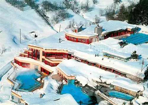 AK / Ansichtskarte Leukerbad Thermal Badecenter im Winter Fliegeraufnahme Kat. Loeche les Bains