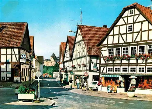 AK / Ansichtskarte Waldeck Edersee Fachwerkhaeuser mit Schloss