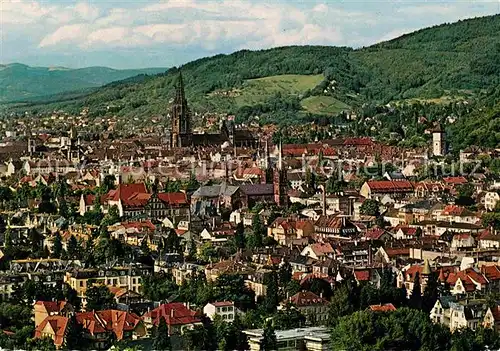 AK / Ansichtskarte Freiburg Breisgau Stadtbild mit Muenster Blick zum Schlossberg und ins Elztal Kat. Freiburg im Breisgau