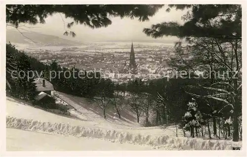 AK / Ansichtskarte Freiburg Breisgau Stadtblick mit Muenster Kat. Freiburg im Breisgau