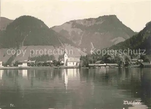 AK / Ansichtskarte Walchsee Tirol Blick zur Kirche vom See aus Alpen Kat. Walchsee