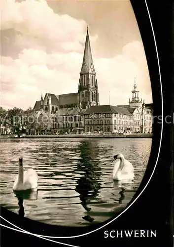 AK / Ansichtskarte Schwerin Mecklenburg Blick ueber den See zur Kirche Schwaene Kat. Schwerin