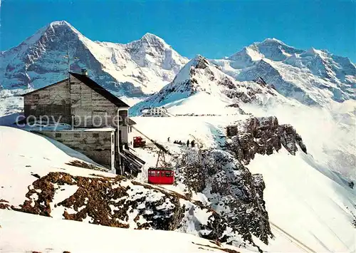 AK / Ansichtskarte Seilbahn Wengen Maennlichen Eiger Moench Jungfrau Tschuggen  Kat. Bahnen