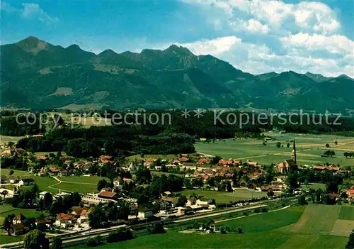 AK / Ansichtskarte uebersee Chiemsee Fliegeraufnahme mit Kampenwand