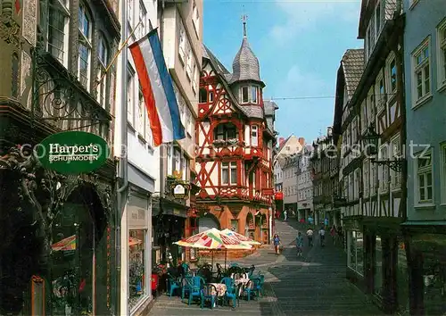 AK / Ansichtskarte Marburg Lahn Wettergasse Fachwerkhaeuser Strassencafe Fussgaengerzone Kat. Marburg