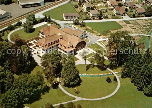 AK / Ansichtskarte Konolfingen BE Evangelisches Zentrum Schloss Huenigen Fliegeraufnahme  Kat. Konolfingen