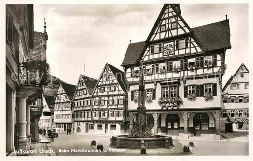 AK / Ansichtskarte Urach Bad Marktbrunnen und Rathaus Kat. Bad Urach