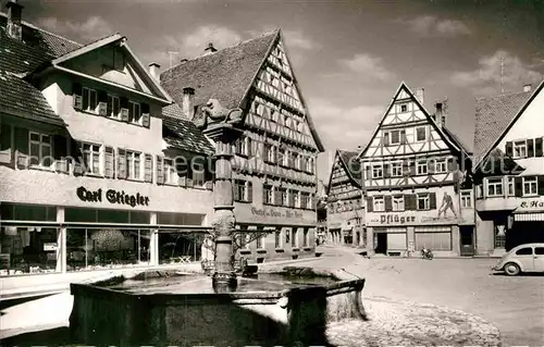 AK / Ansichtskarte Muensingen Marktplatz mit Brunnen Kat. Muensingen