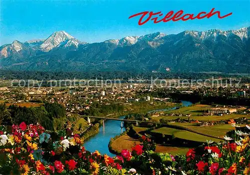 AK / Ansichtskarte Villach Kaernten Panorama Draustadt mit Mittagskogel Karawanken Kat. Villach